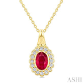 6X4 MM Oval Shape Ruby and 1/6 Ctw Round Cut Diamond Bold Precious Pendant With Chain in 10K Yellow Gold