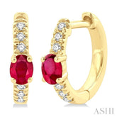 4X3 MM Petite Oval Cut Ruby and 1/10 Ctw Round Cut Diamond Fashion Huggies in 10K Yellow Gold