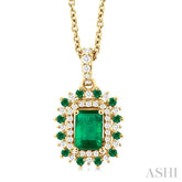 6X4 MM Emerald Cut & 1.55 MM Round Cut Emerald and 1/5 Ctw Round Cut Diamond Floral Precious Pendant With Chain in 14K Yellow Gold