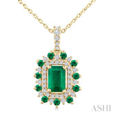 6X4 MM Emerald Cut & 1.55 MM Round Cut Emerald and 1/5 Ctw Round Cut Diamond Floral Precious Pendant With Chain in 14K Yellow Gold