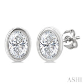 1/5 Ctw Petite Bezel Set Oval Cut Diamond Fashion Stud Earrings in 10K White Gold