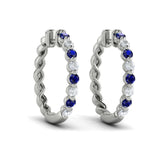 Diamond and Blue Sapphire Twist Hoop Earrings