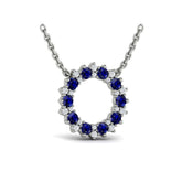 Diamond and Blue Sapphire Open Starburst Circle Pendant Necklace