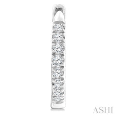 1/4 Ctw Round Cut Diamond Huggie Petite Earrings in 10K White Gold