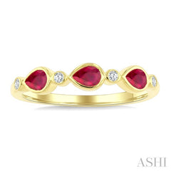4X3 MM Pear Shape Ruby and 1/20 Ctw Bezel Set Round Cut Diamond Precious Fashion Band in 10K Yellow Gold