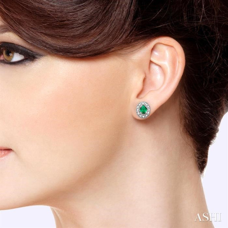 4x3 MM Oval Shaped Emerald and 1/10 Ctw Single Cut Diamond Earrings in 10K White Gold