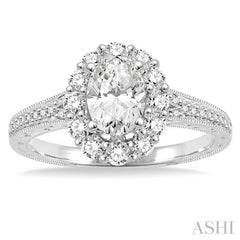 1 1/6 Ctw Diamond Engagement Ring with 5/8 Ct Oval Cut Center Stone in 14K White Gold