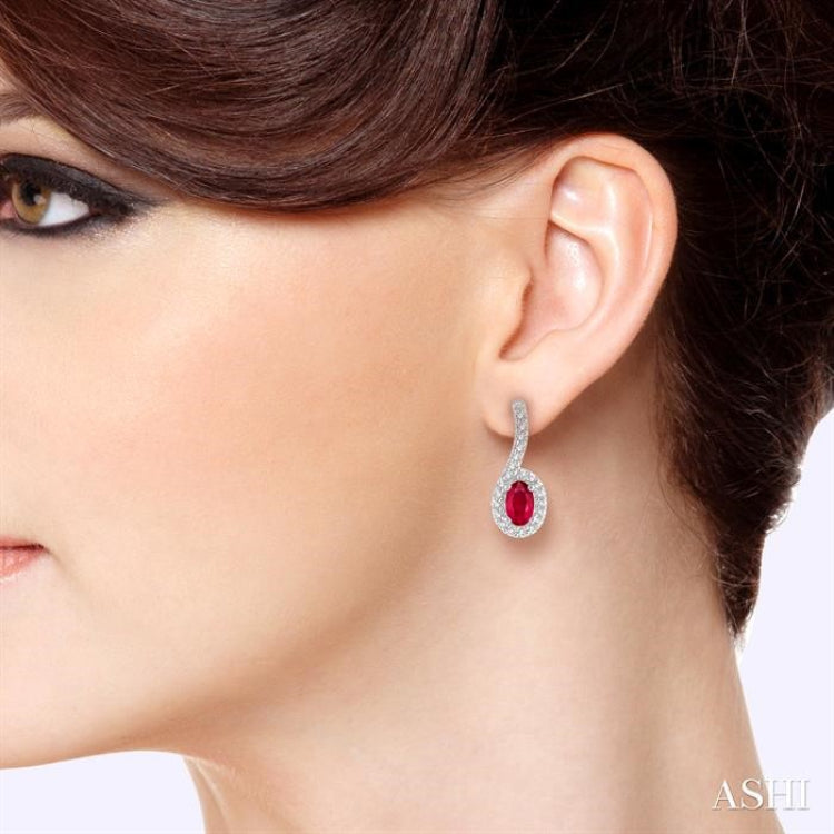 5x3 MM Hanging Arm Oval Cut Ruby and 1/6 Ctw Round Cut Diamond Precious Earring in 10K White Gold