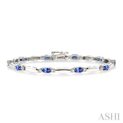 1/10 Ctw Bar and Oval Mount Round Cut Diamond & 5x3MM Oval Cut Tanzanite Precious Bracelet in 10K White Gold