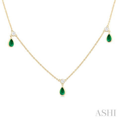 1/8 ctw Round Cut Diamonds and 5X3MM Pear Shape Emerald Precious Station Necklace in 10K Yellow Gold