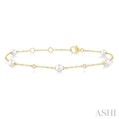 1/20 Ctw 4 MM Cultured Pearl and Round Cut Diamond Fashion Station Bracelet in 14K Yellow Gold