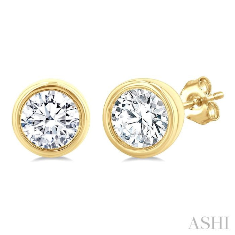 1/5 Ctw Petite Bezel Set Round Cut Diamond Fashion Stud Earrings in 10K Yellow Gold
