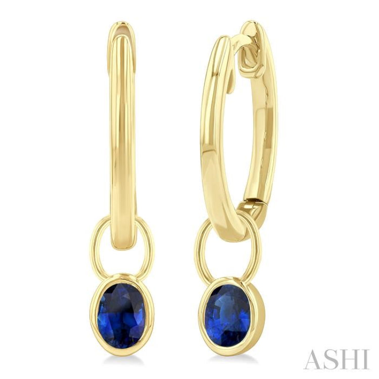 5x3 MM Bezel Set Oval Cut Sapphire Precious Fashion Huggie Earrings in 10K Yellow Gold