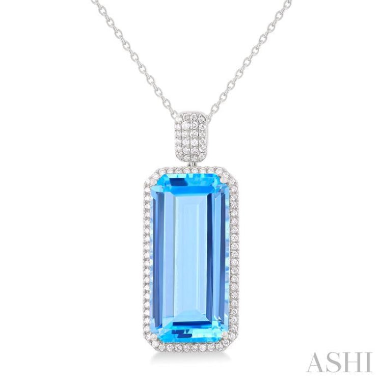 26X12 MM Emerald Cut Blue Topaz and 1/2 Ctw Round Cut Diamond Halo Semi-Precious Pendant With Chain in 14K White Gold