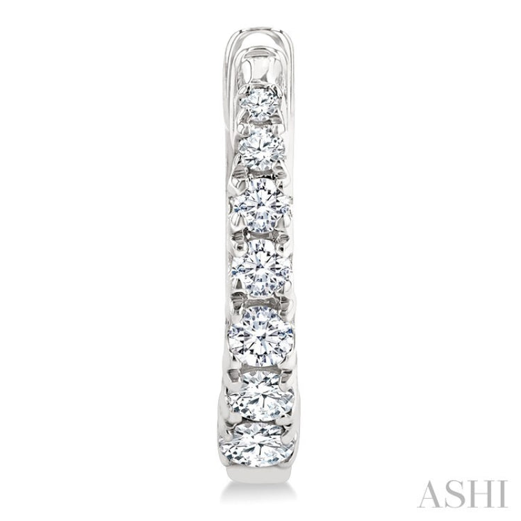 1/4 Ctw Graduated Round Cut Diamond Fashion Huggies in 14K White Gold