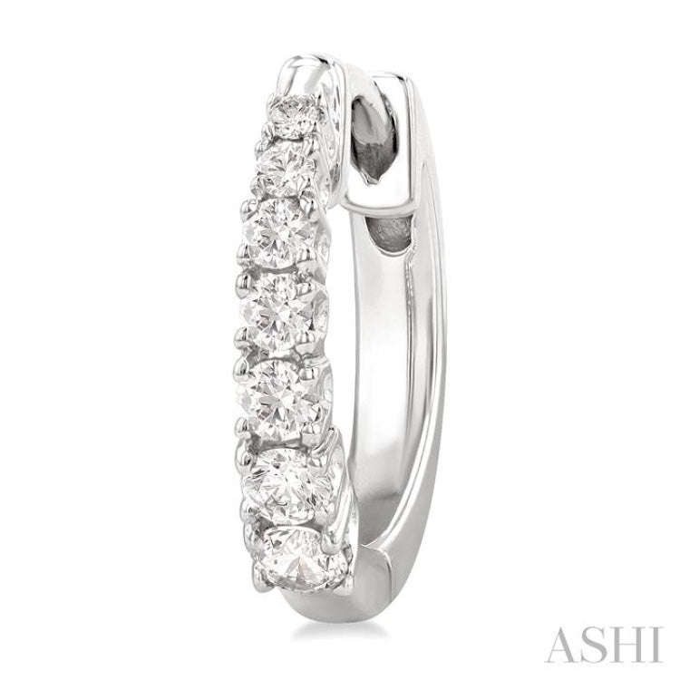 1/4 Ctw Graduated Round Cut Diamond Fashion Huggies in 14K White Gold