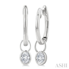 1/3 Ctw Bezel Set Oval Cut Diamond Huggie Earrings in 14K White Gold