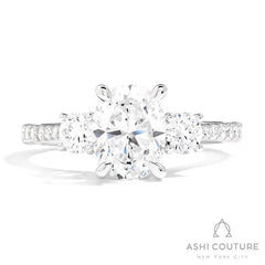 Bridal 3-Stone Diamond Oval Semi-Mount Engagement Ring With Round Side Diamonds in White Gold