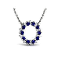 Diamond and Blue Sapphire Open Starburst Circle Pendant Necklace